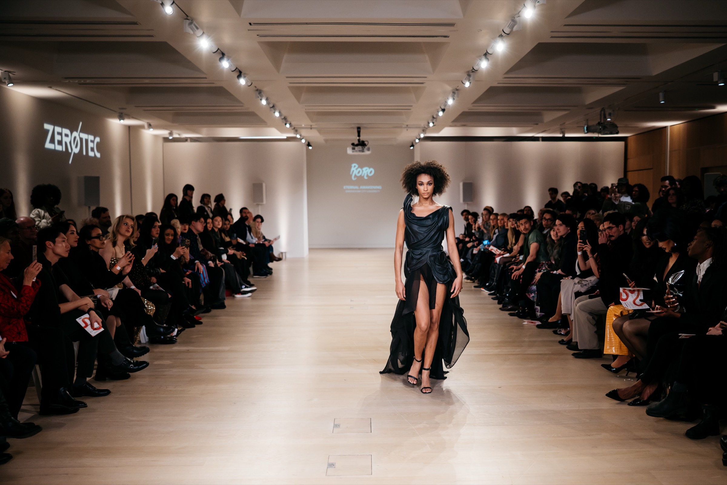 A model walking the runway at RORO's Eternal Awakening show at a Fashion 4.0 London Fashion Week showcase